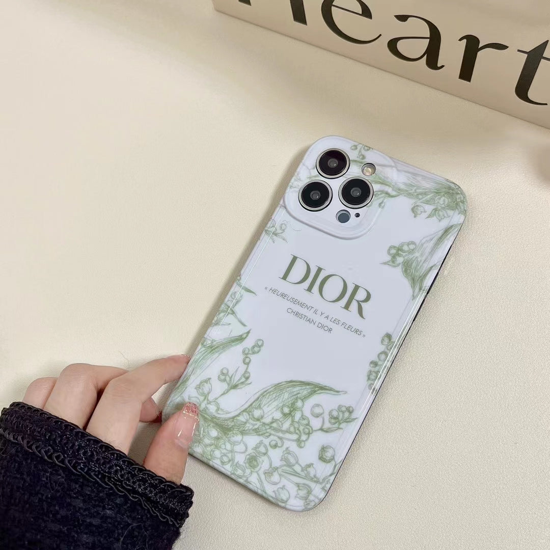 Ergonomic Comfort - Holding the Dior Fashion Lady iPhone Case with Subtle Flower Embellishments